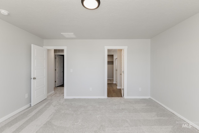 5289 E Grizzly St, Nampa, ID 83687 - unfurnished bedroom featuring carpet flooring, baseboards, and a spacious closet