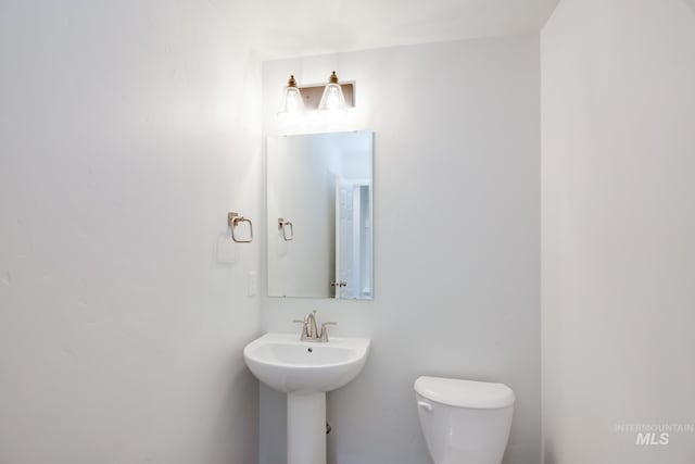 5289 E Grizzly St, Nampa, ID 83687 - half bath with toilet and a sink