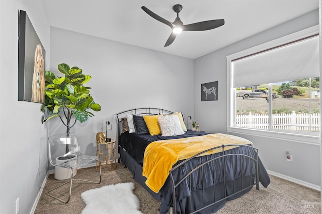 2570 Reservoir Rd, Clarkston, WA 99403 - bedroom with carpet flooring, baseboards, and a ceiling fan
