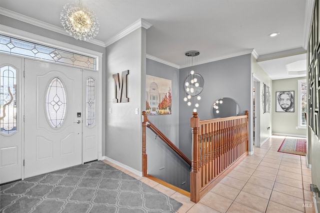 2570 Reservoir Rd, Clarkston, WA 99403 - entrance foyer with a chandelier, baseboards, light tile patterned floors, and crown molding