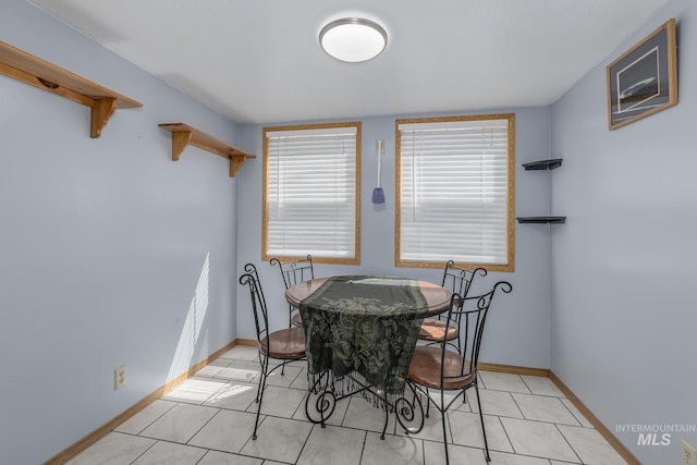 5132 S Council Bluffs Way, Boise, ID 83716 - dining space featuring baseboards and light tile patterned floors