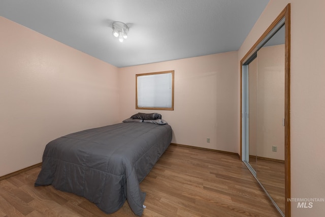5132 S Council Bluffs Way, Boise, ID 83716 - bedroom with wood finished floors and baseboards