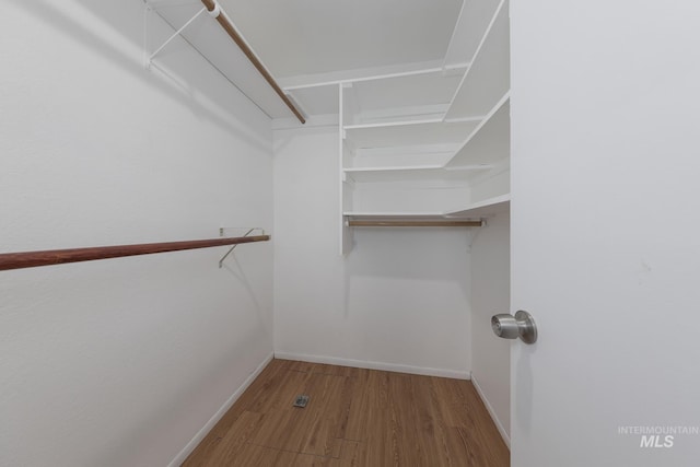 5132 S Council Bluffs Way, Boise, ID 83716 - spacious closet featuring wood finished floors