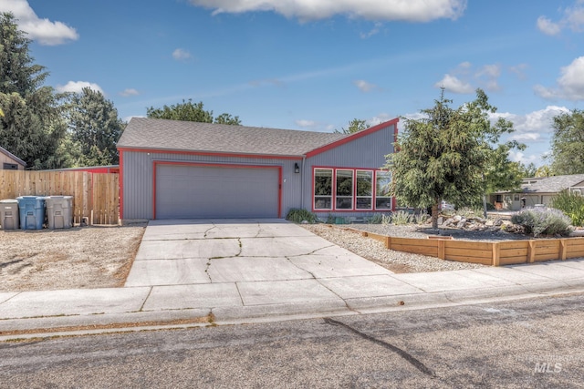 5132 S Council Bluffs Way, Boise, ID 83716 - view of front of house featuring concrete driveway, a garage, and roof with shingles