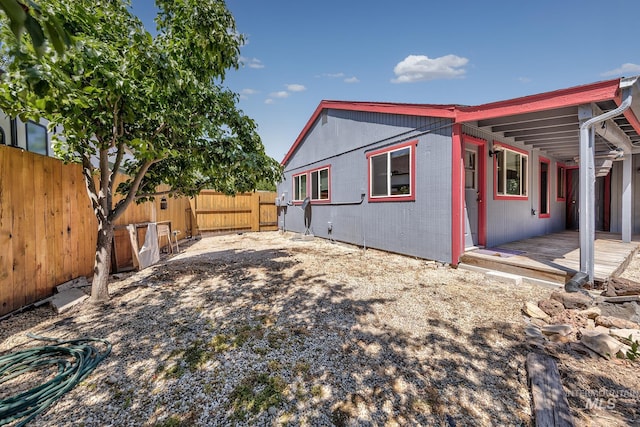 5132 S Council Bluffs Way, Boise, ID 83716 - view of home's exterior with a fenced backyard and a wooden deck