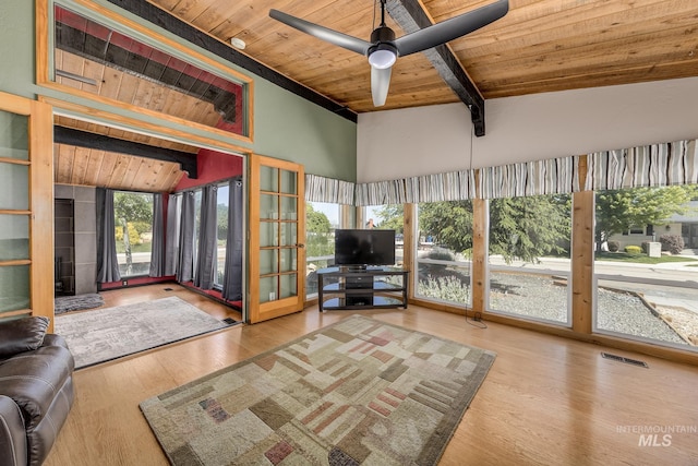5132 S Council Bluffs Way, Boise, ID 83716 - living area with wood ceiling with exposed beams, french doors, wood finished floors, and high vaulted ceiling