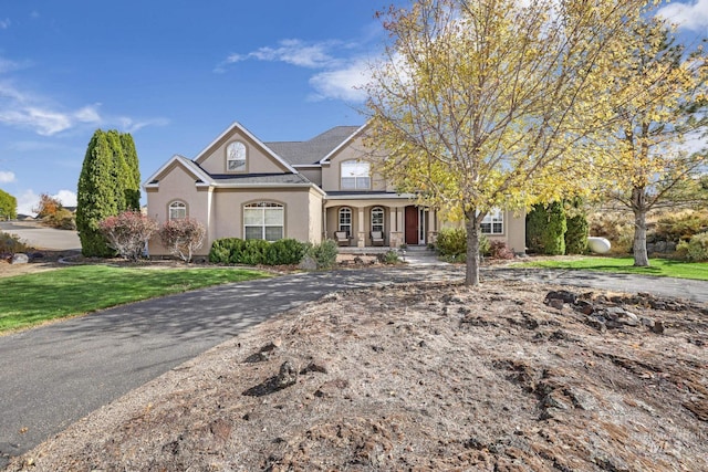 3408 Ridgeline Dr, Kimberly, ID 83341 - traditional-style house with a front yard and stucco siding