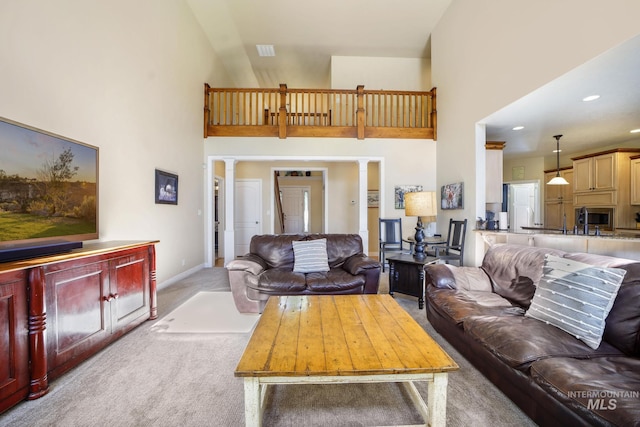 3408 Ridgeline Dr, Kimberly, ID 83341 - carpeted living room featuring baseboards, visible vents, a towering ceiling, and recessed lighting