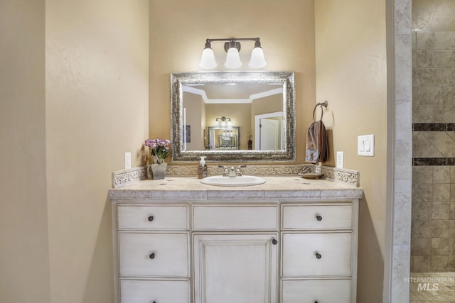 3408 Ridgeline Dr, Kimberly, ID 83341 - bathroom featuring vanity, ornamental molding, and a tile shower