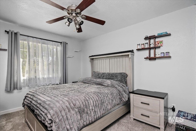 4226 E Tahiti St, Meridian, ID 83646 - bedroom featuring carpet flooring, baseboards, ceiling fan, and a textured ceiling