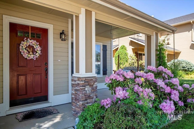 4226 E Tahiti St, Meridian, ID 83646 - entrance to property with covered porch and stone siding