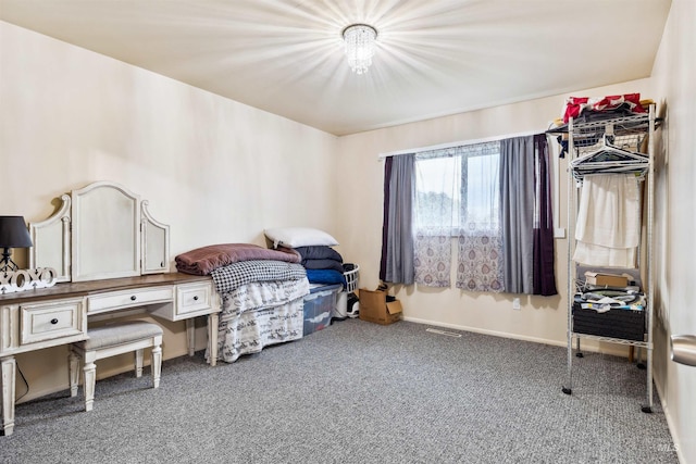 bedroom featuring dark carpet