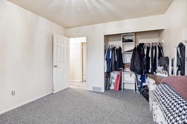 bedroom featuring a closet and carpet