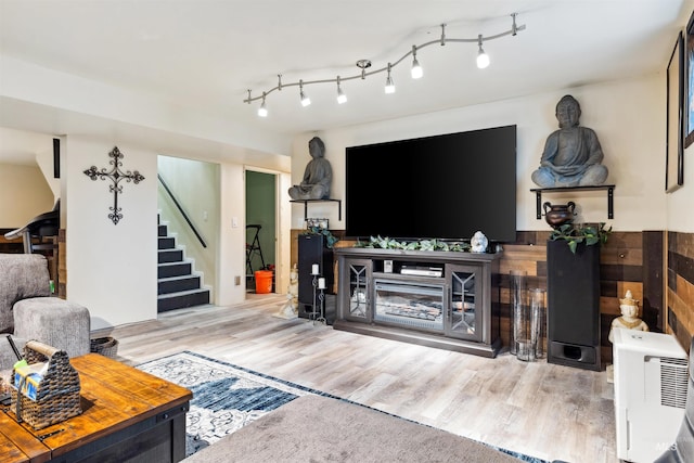 living room with light hardwood / wood-style flooring