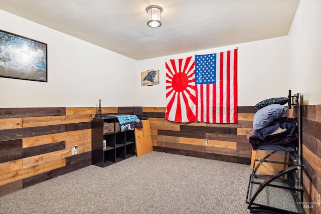 office space featuring carpet flooring and wooden walls