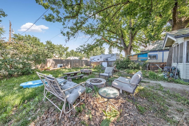 538 N 6th St, Payette, ID 83661 - fenced backyard featuring an outdoor fire pit