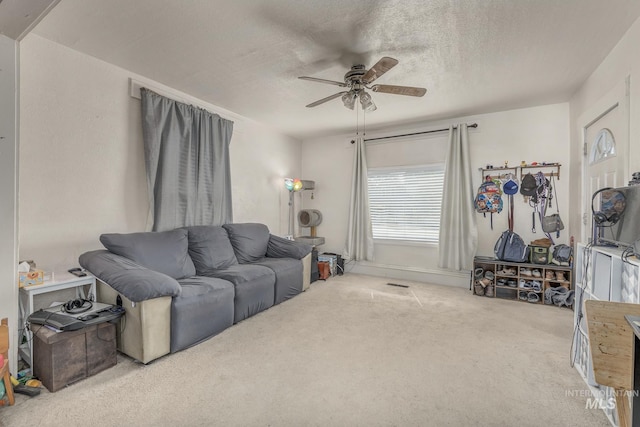 538 N 6th St, Payette, ID 83661 - living room featuring ceiling fan, carpet floors, and a textured ceiling