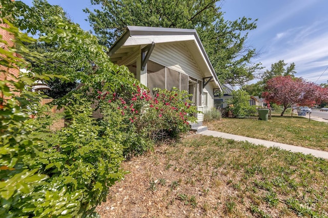 538 N 6th St, Payette, ID 83661 - view of property exterior with a sunroom