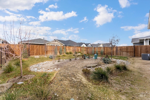 view of yard featuring central AC