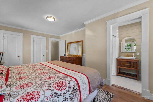 1924 Cleveland Blvd, Caldwell, ID 83605 - bedroom with crown molding, wood finished floors, and ensuite bathroom