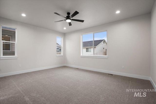 5801 W Escalante, Eagle, ID 83616 - empty room featuring carpet floors, ceiling fan, recessed lighting, and baseboards