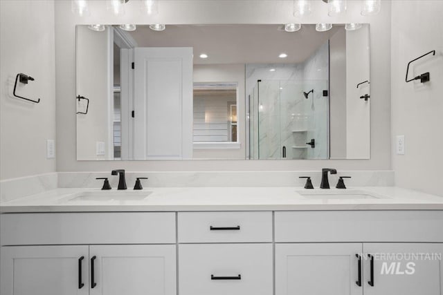 5801 W Escalante, Eagle, ID 83616 - full bath featuring a sink, a marble finish shower, double vanity, and recessed lighting