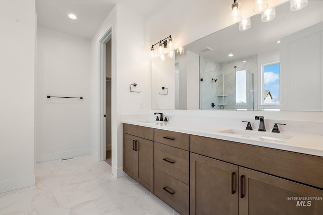 5801 W Escalante, Eagle, ID 83616 - bathroom featuring a sink, baseboards, marble finish floor, and a stall shower