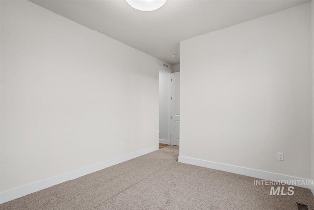 5801 W Escalante, Eagle, ID 83616 - empty room with visible vents, baseboards, and carpet flooring