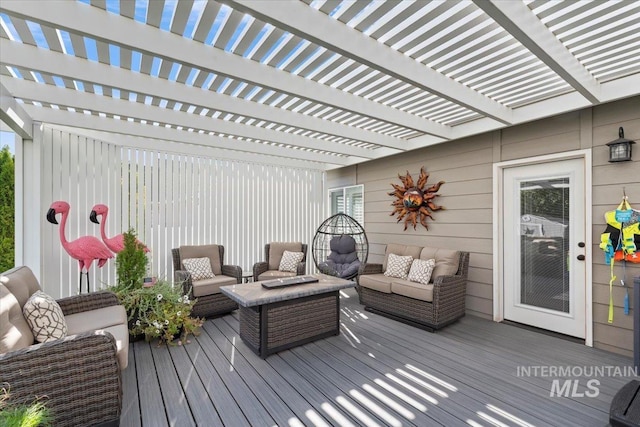 wooden terrace with an outdoor living space and a pergola