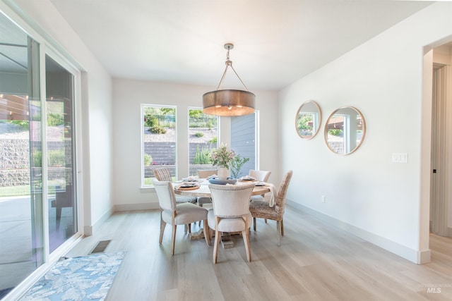 2649 E Mardia St, Meridian, ID 83642 - dining space featuring light wood finished floors and baseboards