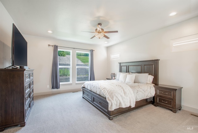 2649 E Mardia St, Meridian, ID 83642 - bedroom featuring light carpet, recessed lighting, a ceiling fan, and baseboards