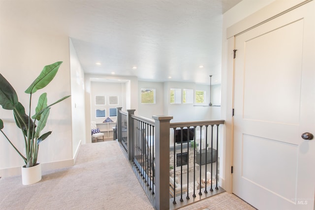 2649 E Mardia St, Meridian, ID 83642 - hallway with an upstairs landing, baseboards, and carpet