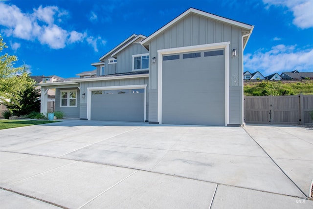 2649 E Mardia St, Meridian, ID 83642 - view of front of home with board and batten siding, concrete driveway, and a garage