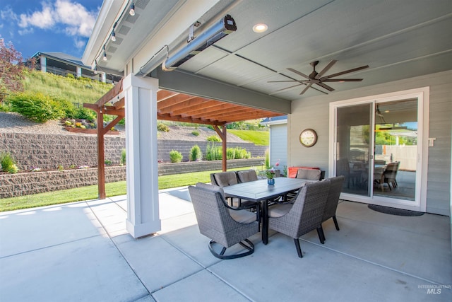 2649 E Mardia St, Meridian, ID 83642 - fenced backyard with outdoor dining area, a patio area, and a ceiling fan