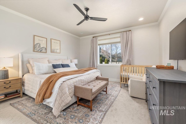 bedroom with recessed lighting, light colored carpet, a ceiling fan, baseboards, and ornamental molding