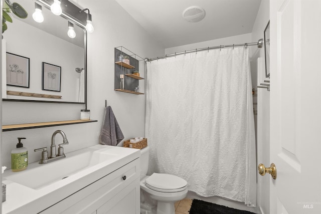 bathroom featuring tile patterned floors, visible vents, toilet, vanity, and a shower with curtain