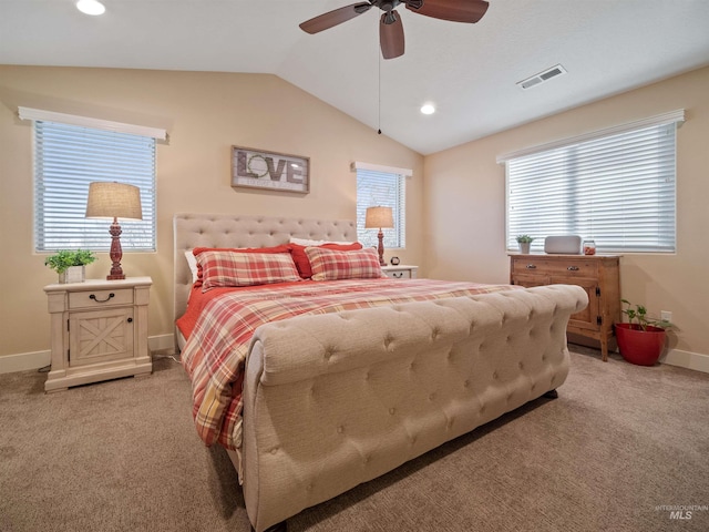 carpeted bedroom with lofted ceiling and ceiling fan