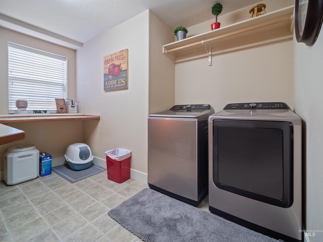 laundry area featuring separate washer and dryer