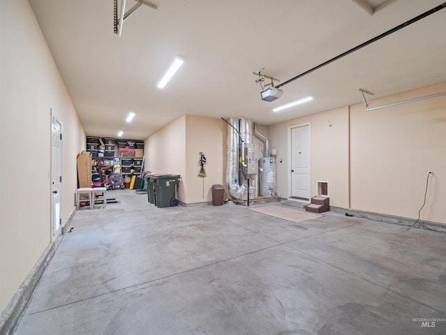 garage with a garage door opener and gas water heater