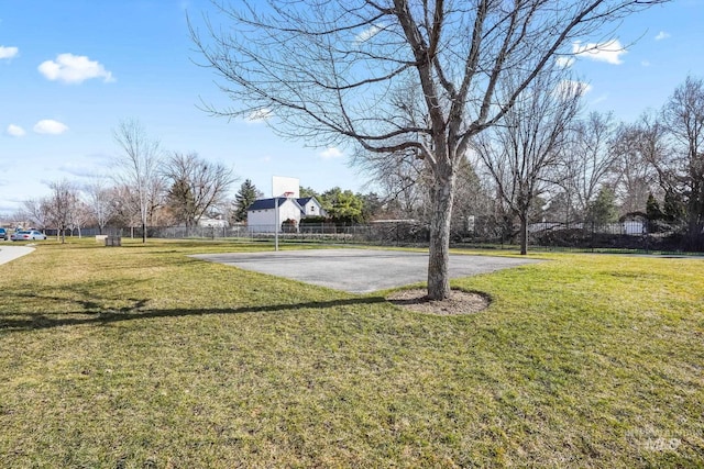 view of yard featuring basketball court