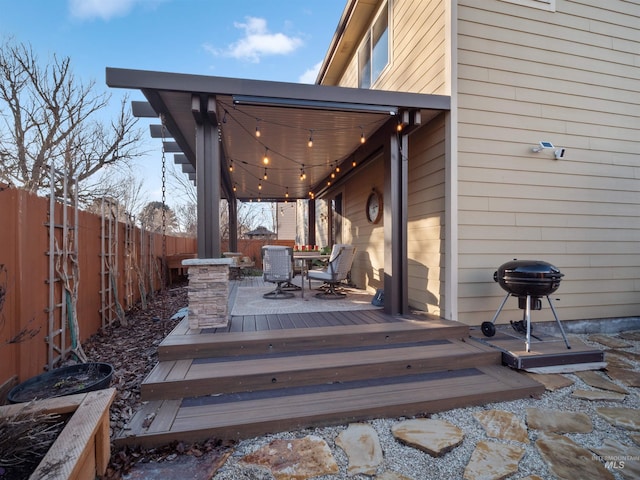 wooden deck with area for grilling