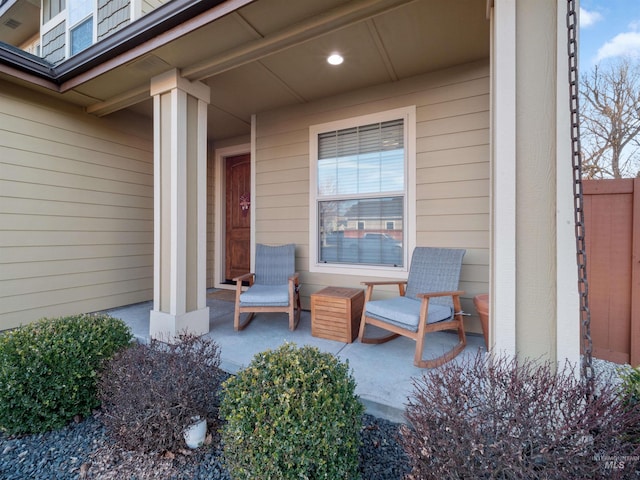 entrance to property featuring a porch