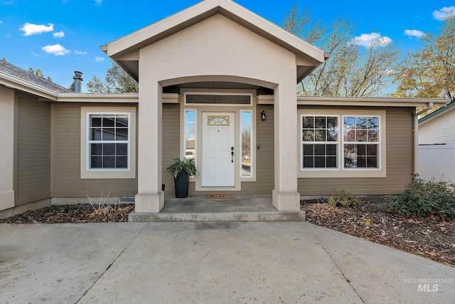 doorway to property with a porch