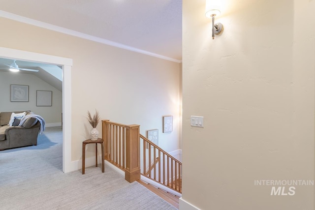 1049 E Riversong Dr, Eagle, ID 83616 - stairway featuring ornamental molding, baseboards, and carpet floors