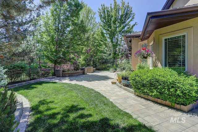1049 E Riversong Dr, Eagle, ID 83616 - view of yard with a patio area