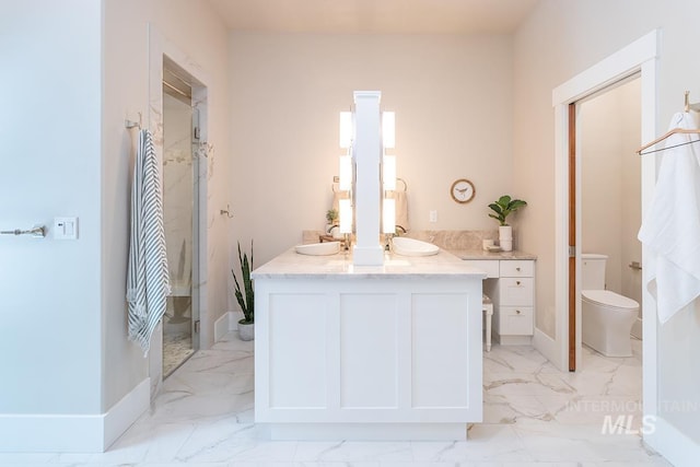 1049 E Riversong Dr, Eagle, ID 83616 - bathroom featuring toilet, marble look tile flooring, double vanity, and a shower stall
