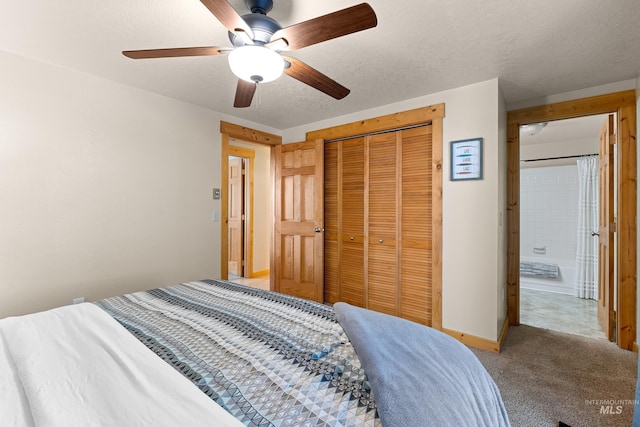 305 Gabi Ln, Mccall, ID 83638 - bedroom featuring a closet, baseboards, a ceiling fan, a textured ceiling, and light carpet