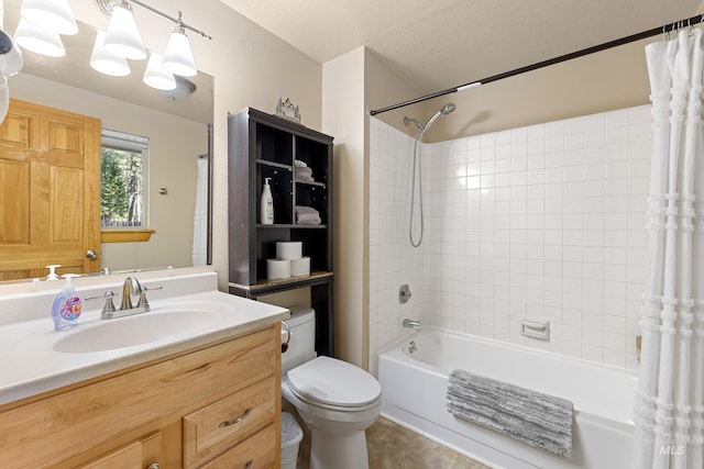 305 Gabi Ln, Mccall, ID 83638 - bathroom with shower / bath combo, toilet, vanity, and a textured ceiling