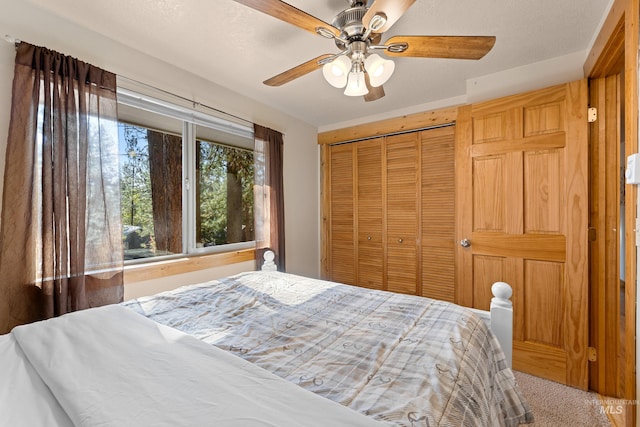 305 Gabi Ln, Mccall, ID 83638 - bedroom featuring a closet and a ceiling fan