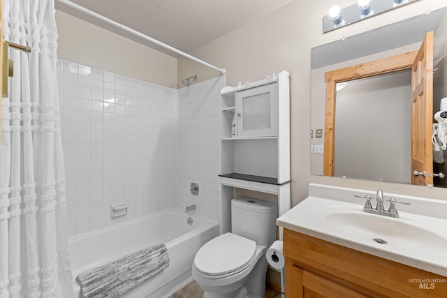 305 Gabi Ln, Mccall, ID 83638 - bathroom featuring shower / tub combo, toilet, vanity, and a textured ceiling
